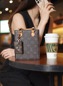 Keychain phone bag crafted by a celebrity designer